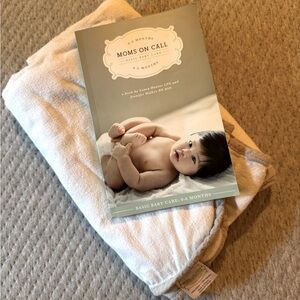 Mom’s On Call 0-6 months book with official swaddle blanket